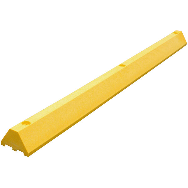 A yellow rectangular plastic parking block with channels.