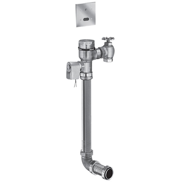 A metal pipe with a Sloan rough brass sensor flush valve and white square fixture connection.