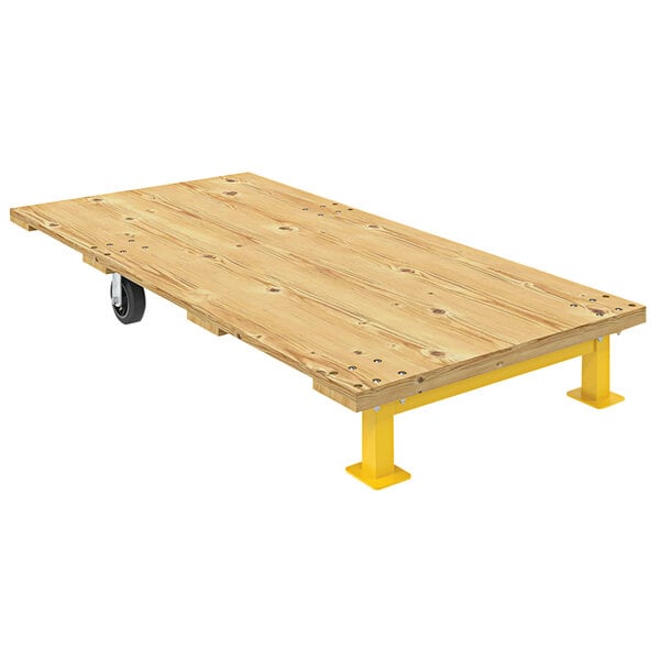 A wooden platform with yellow legs and wheels.