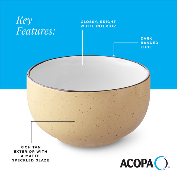 A 13 oz. stoneware bowl with a glossy white interior, dark banded edge, and a rich tan matte speckled exterior.