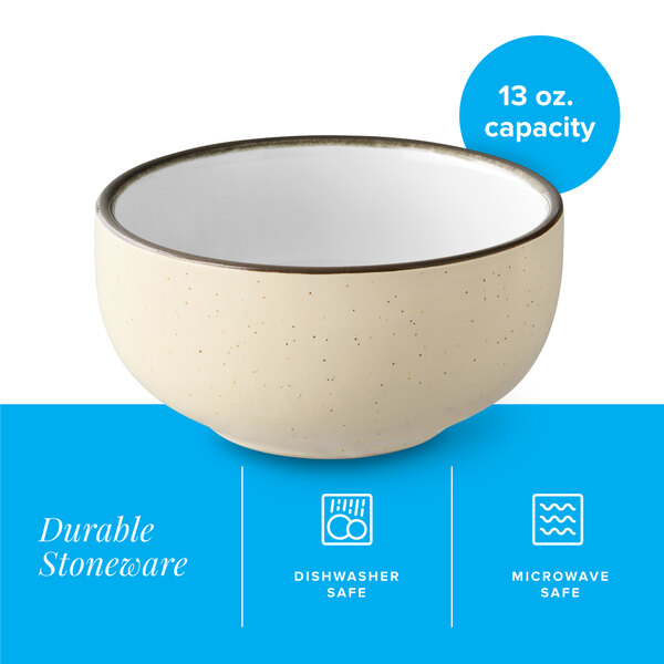 A cream white matte stoneware bowl with a 13 oz. capacity.