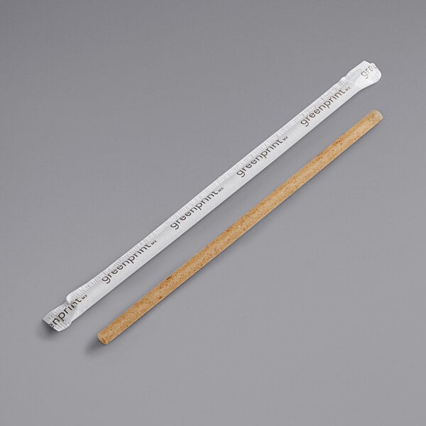 Two Greenprint natural agave straws wrapped in white paper with brown and black accents.