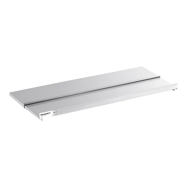 A rectangular stainless steel sliding lid with a handle, designed to fit over a drop-in ice bin.