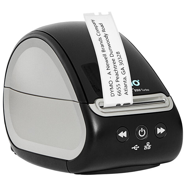 A DYMO label printer with a label attached to it.