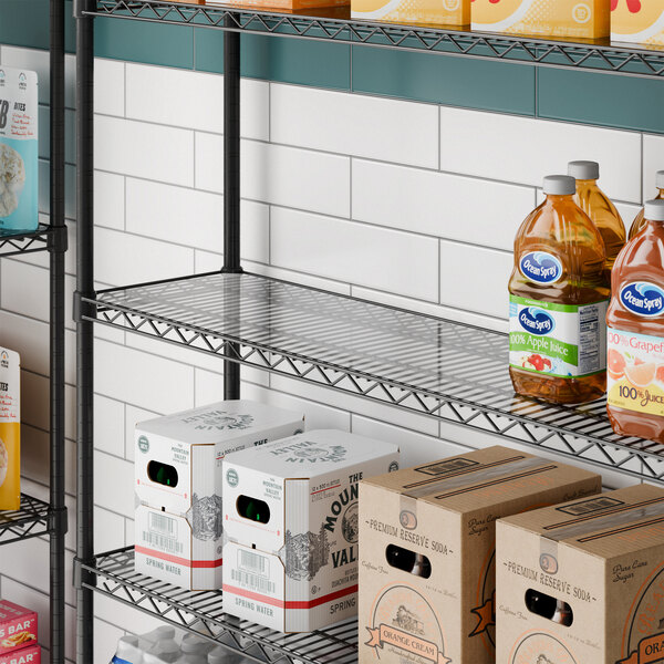 A clear PVC shelf liner placed on a wire shelving unit.