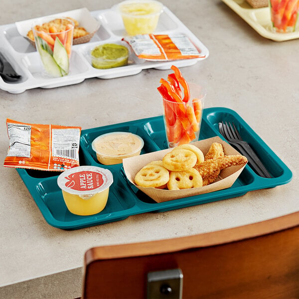 A Right Handed Ocean Teal Choice 6 Compartment Tray with food and drinks on a table.