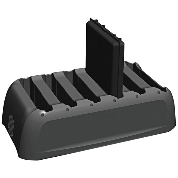 A black battery charger with rectangular slots for three black DT Research batteries.
