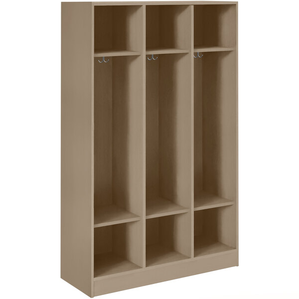 A brown I.D. Systems locker with shelves and two doors.