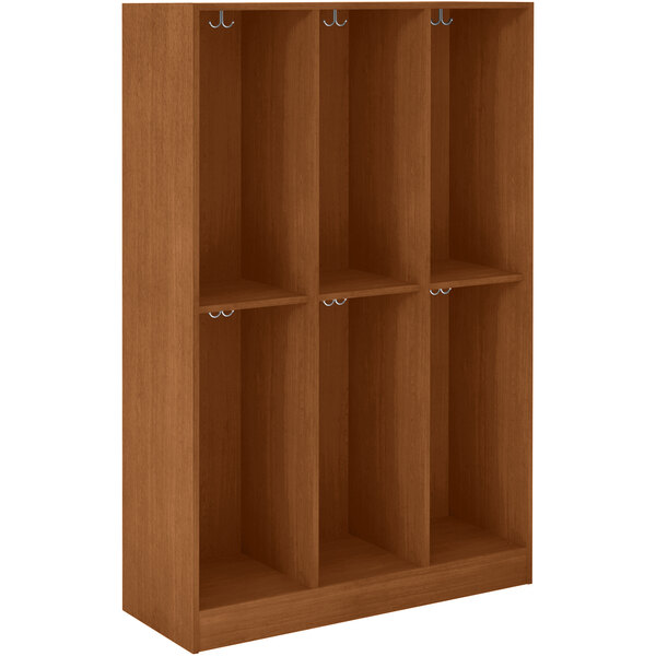 A medium cherry wooden locker with four doors and four shelves.