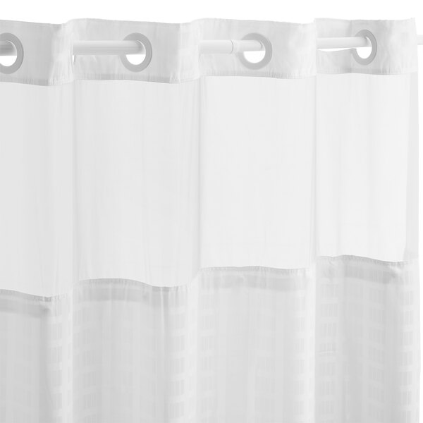 A white Hookless shower curtain with rings.