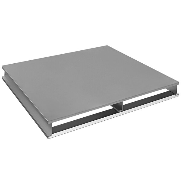 A grey table with a Vestil aluminum pallet with a solid top.