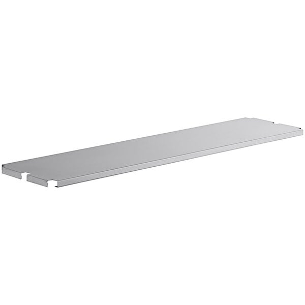 A white rectangular metal shelf.