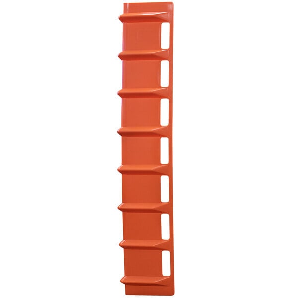 An orange plastic Lavex edge protector with holes.