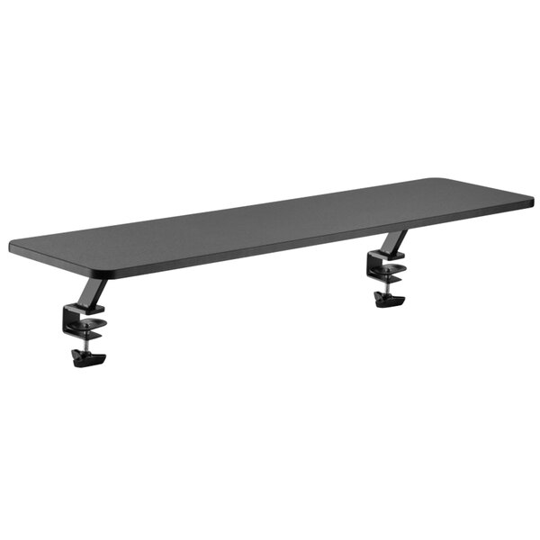 A black rectangular desk shelf with metal clamps on the bottom.