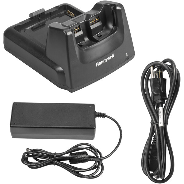 A black Honeywell HomeBase charging kit with cables and power supply.