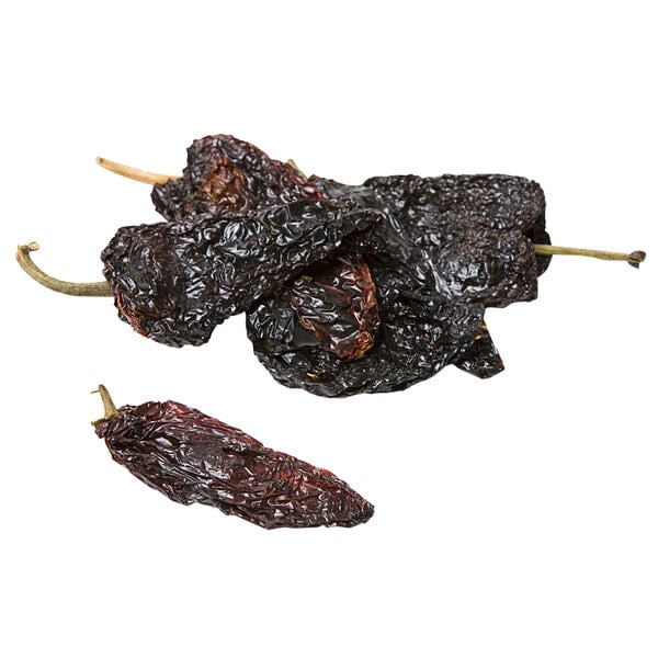 A pile of dried Ancho chile peppers.