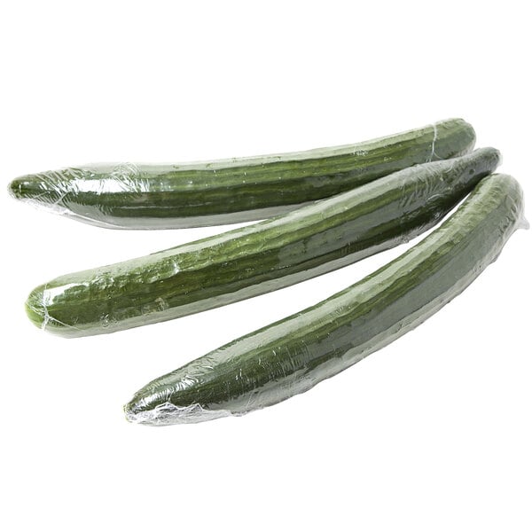 Fresh English Cucumbers wrapped in plastic.