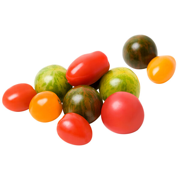 A close up of a group of mixed color cherry tomatoes.