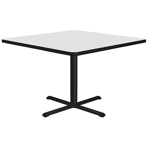 A Correll white square table with black base.