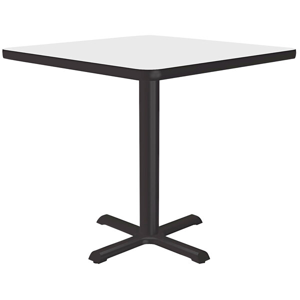 A Correll white square table top with black base.