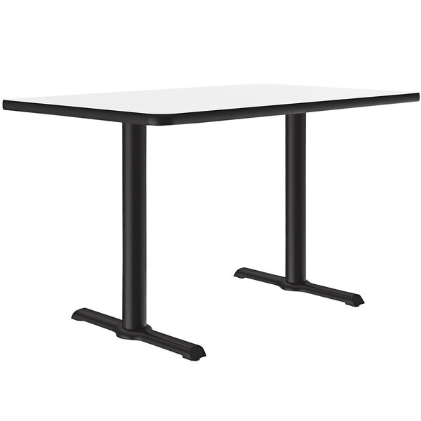 A white rectangular Correll cafe table with two black T bases.