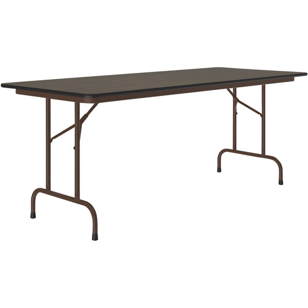 A Correll rectangular folding table with a walnut laminate top and brown frame.