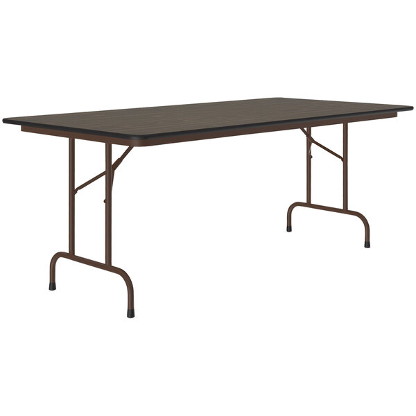 A Correll rectangular folding table with a walnut top and brown frame.