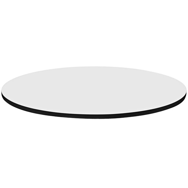 A white circular Correll table top with black edges.