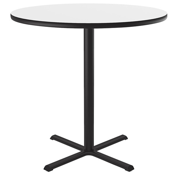 A Correll white bar height table with a black base.