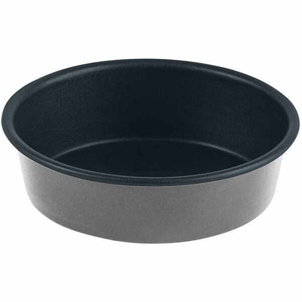 A black round Gobel cake pan with a black rim.