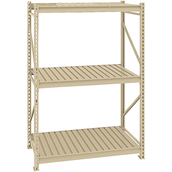 A beige Tennsco metal boltless shelving unit with corrugated decking.