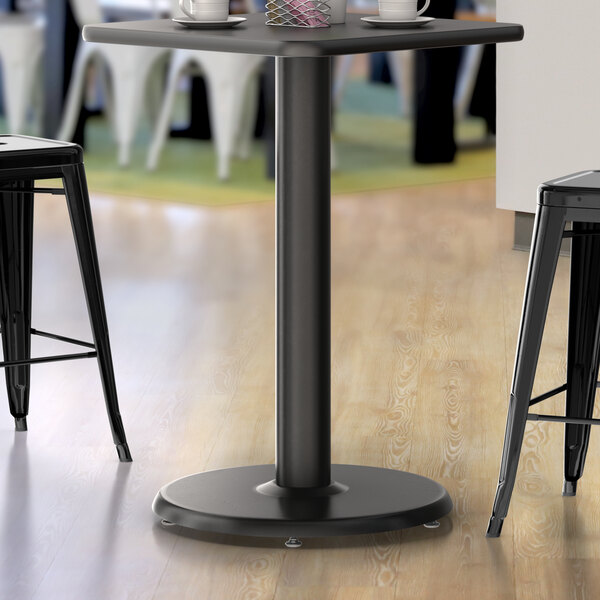 Lancaster Table & Seating Stamped Steel 22" Round Black 4" Counter