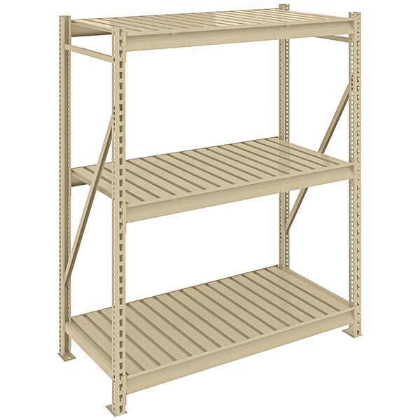 A tan Tennsco boltless shelving unit with corrugated metal shelves.