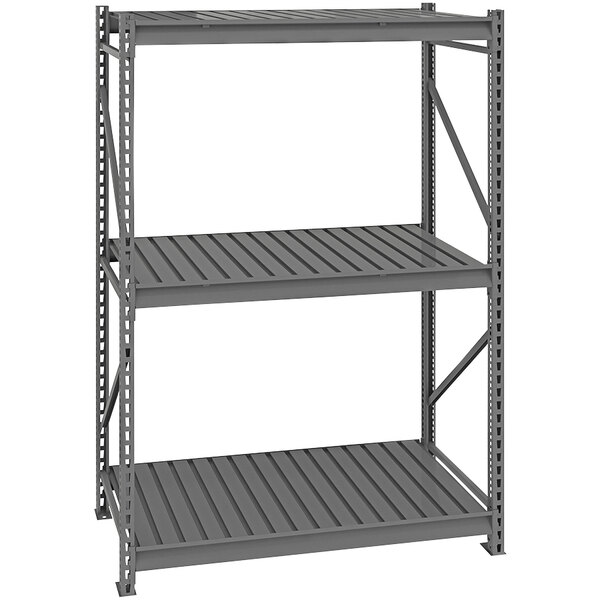 A dark gray Tennsco metal boltless shelving unit with corrugated decking.