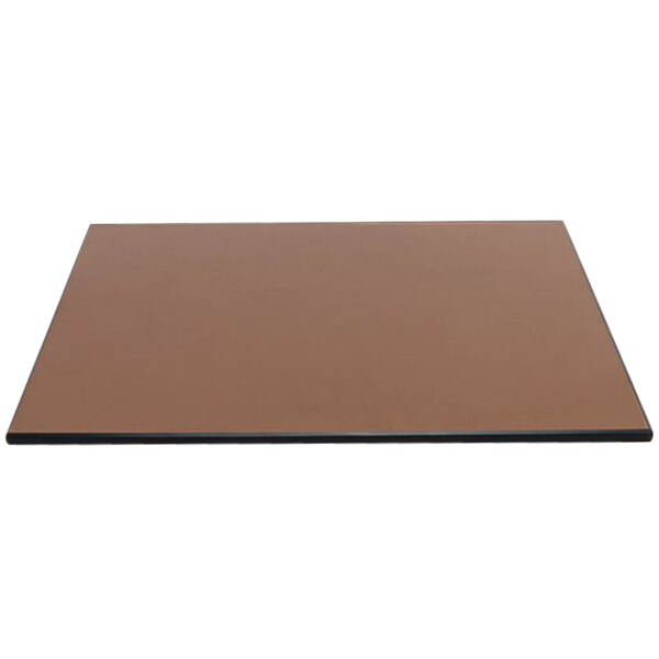 A brown square Front of the House buffet board with black edges on a table.