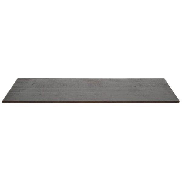 A black rectangular Front of the House Mahogany bamboo buffet board on a grey surface.