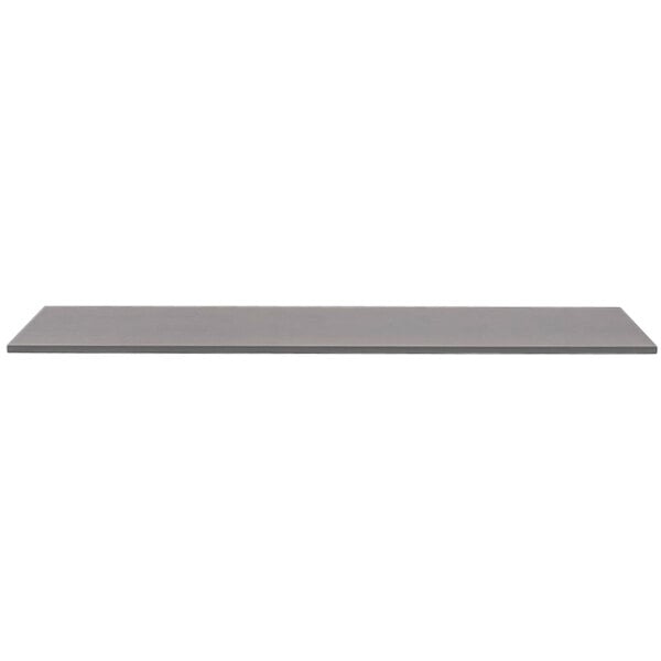 A grey rectangular Front of the House bamboo buffet board on a table.