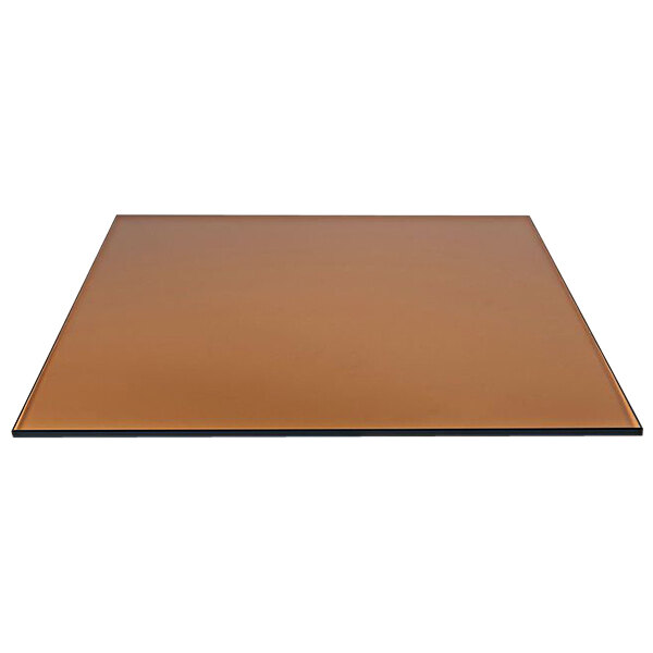 A square amber glass buffet board with black edges.