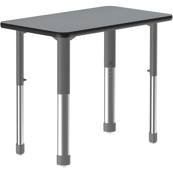 A grey rectangular Correll collaborative desk with black and grey metal legs.