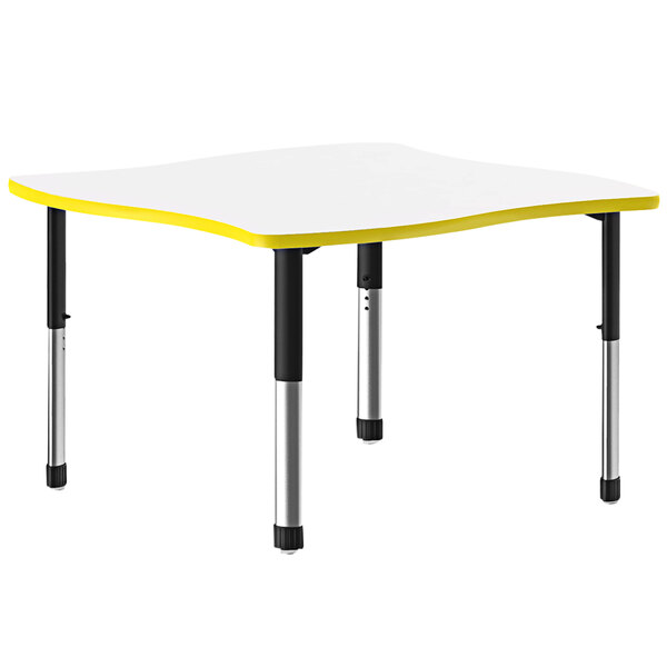 A white Correll table with a yellow band and black legs.