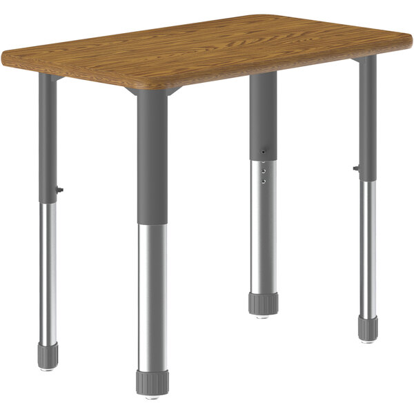 A rectangular wood table with metal legs.