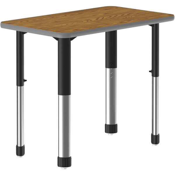 A Correll rectangular table with metal legs.
