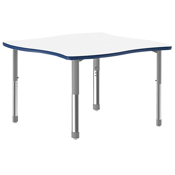 A white rectangular table with a white dry-erase top with blue trim.