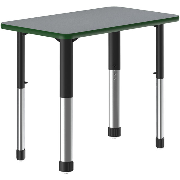 A grey rectangular Correll collaborative desk with a green border and black metal legs.