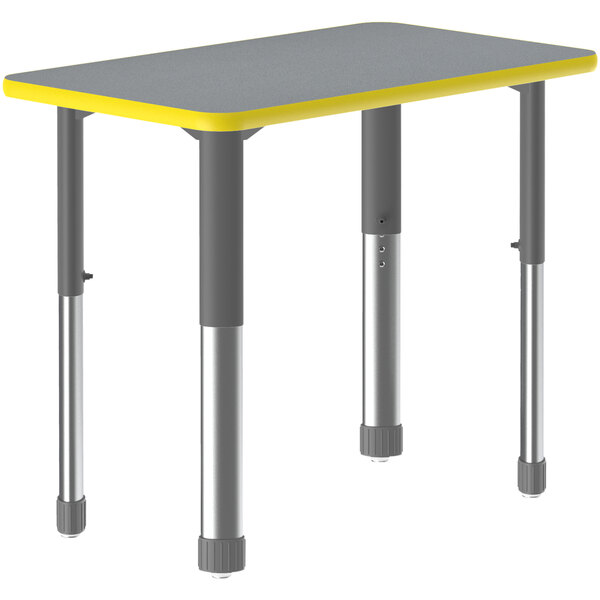 A grey and yellow Correll rectangular table with metal legs.