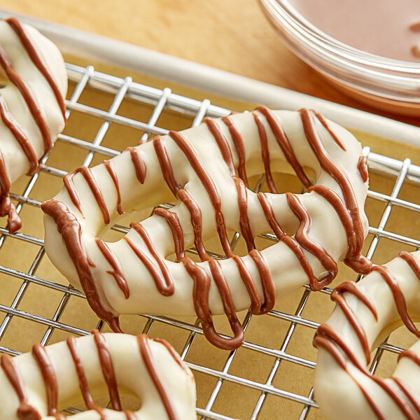 A pretzel drizzled with Regal Foods milk chocolate coating.