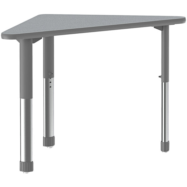 A gray triangular Correll table with metal legs.