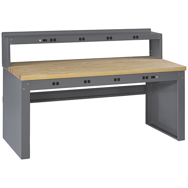 A grey Tennsco workbench with a wooden top and riser panel.