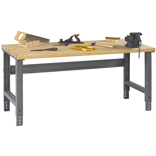 A Tennsco hardwood workbench with tools on it.
