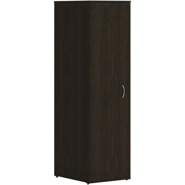 A dark wood cabinet with a silver handle.